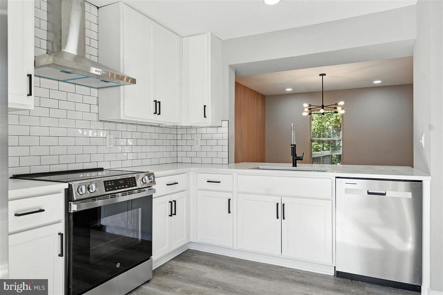 Priced To Sell Fast! Highly Desirable Updated 3 Level Townhouse Condo, Spacious Kitchen with QUARTZ Counters, Stainless Steel Appliances, New Cabinets, Modern Tile Backsplash, Spacious Bedrooms, Updated Bathrooms, New Flooring, New Lighting, New Custom Paint, Finished Basement, Deck, Fenced Backyard, Much More!!  Close to Schools, Shopping, Metro, and Commuter Routes.  This Will Not Last!