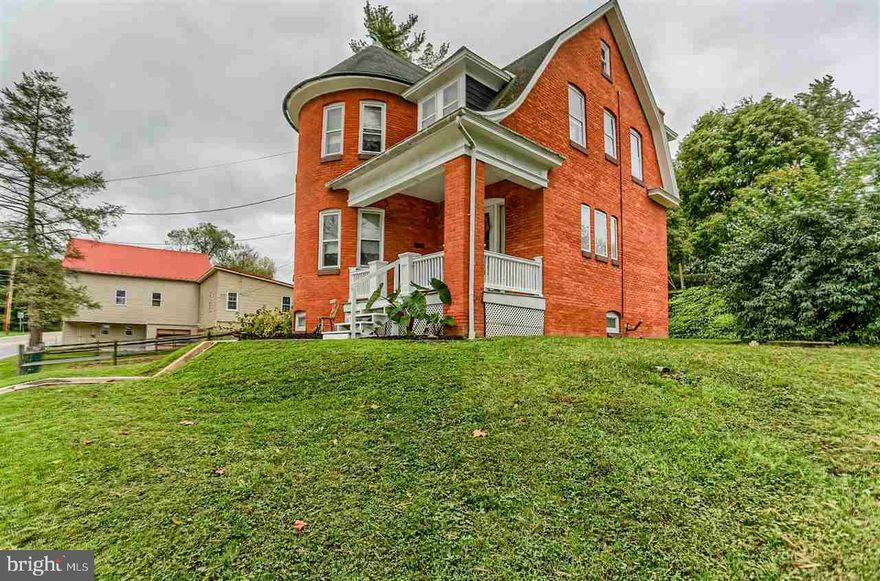Beautifully restored! 3.61 acre farmette w/unique victorian brick farmhouse & large bank barn in wonderful condition.  Rounded, turrent type wall of windows in living room & master BR. 9 ft ceilings, stained glass windows, HW floors, beautiful wood trim & railings. Large formal dining room. Eat-in oak kitchen w/stainless appliances. Barn w/ 5 garage doors. Pasture fenced for animals w/run-in shed. Summer house, garage, woodshed & garden shed.