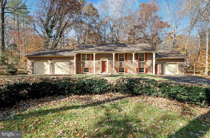 Welcome to 13460 Grandpas Rd, $10,000 Price Improvement! — a beautifully renovated single-family home nestled on a private, wooded one-acre lot in the heart of Nokesville, Virginia.

This stunning 4-bedroom, 2.5-bath home combines modern upgrades with timeless comfort. Enjoy an open-concept layout featuring a gourmet kitchen with upgraded granite countertops, premium stainless-steel appliances, and abundant cabinetry.

Relax by the brick fireplace in the spacious lower-level family room or entertain on the expansive rear deck overlooking the peaceful wooded surroundings. The home also features an attached three-car garage, a circular driveway, and ample parking space.

Perfectly located near top-rated schools, shopping, and major commuter routes, this move-in-ready home offers the ideal blend of luxury, space, and convenience.

Don’t miss your chance to own this gorgeous Nokesville gem — schedule your private tour today!