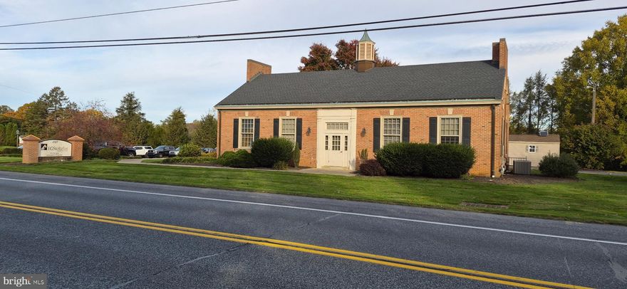 Freestanding professional office building consisting of an entrance area, office manager/ receptionist area, conference room, offices, work area/ kitchenette and a restroom on the main level. The lower level consists of approximately 900 sf of finished offices/ work areas and a restooom. Very professional look inside and out with great visibility and access. 16 space parking lot.