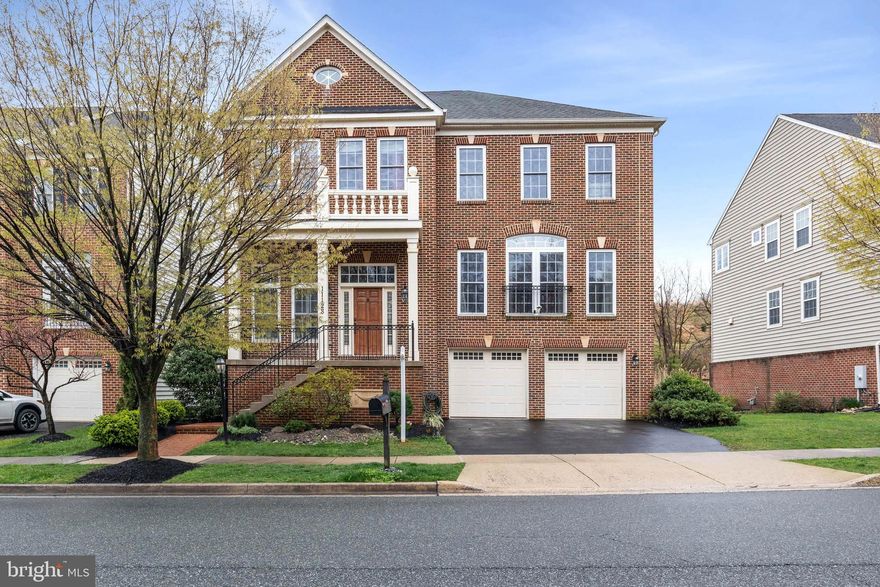 "HOME SWEET HOME" - Beautiful single-family home in the highly desirable POTOMAC EDGE subdivision on the borders of Rockville and Potomac. Nestled in the Wootton High School, Cabin John Middle School, and Stone Mill Elementary School triangle. This 4-bed, 4.5-bath home with over 4,850+ sqft of living space offers a contemporary and spacious living experience. Enjoy the high 11 ft ceilings on the main level, perfect for entertaining and family gatherings. Natural light fills the main living level. This meticulously maintained home features gleaming hardwood floors on the main level and NEW carpet in the lower and upper levels. This home is complete with wooden plantation shutters and Hunter Douglas shades throughout. The sought-after open floor plan includes a stacked stone gas fireplace in the family room, gourmet kitchen with stainless steel appliances, generous pantry, and a center island. The upper-level features 9 ft ceilings, a primary suite with a tray ceiling, a large sitting room, 2 custom walk-in closets, a renovated spa-like bathroom, and a private balcony. Bedroom 2 is en-suite, while bedrooms 3 & 4 share a Jack & Jill bathroom. The lower level offers a cozy living area with a gas fireplace, an additional 5th bedroom or bonus room with a walk-in closet, and a full bath. Custom millwork and recessed lighting throughout much of the house add to the charm of this exceptional home. Home backs to protected area for privacy!