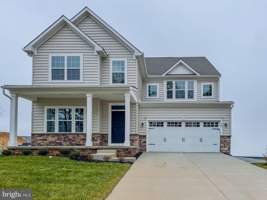 Welcome to 1036 Applecross Drive, a stunning, executive-style home set on a desirable northeast-facing corner lot in the highly sought-after Preserve at Deep Creek community. With a fully fenced backyard and thoughtful upgrades throughout, this home is truly move-in ready and designed to impress.

From the moment you step inside, it’s clear this residence has been meticulously cared for, with an intentional focus on luxury, comfort, and modern living. The main level showcases engineered hardwood flooring throughout and offers an ideal blend of open-concept living and functional spaces. Highlights include a private bedroom or home office with an adjacent 1/2 bath, a formal dining room, and a spacious great room with natural gas fireplace that flows seamlessly into the gourmet kitchen, complete with an oversized island and breakfast area overlooking the expansive paver patio and backyard. A large pantry, mudroom, abundant closet space, and direct garage access complete the main floor.

Upstairs, retreat to the impressive primary suite, featuring two walk-in closets and a spa-like primary bath. The upper level also includes a large open-concept loft, a second bedroom with its own ensuite bath, two additional bedrooms, a hall bath, a generously sized laundry room, and exceptional storage throughout.

The finished lower level expands your living space with high ceilings, a full bath, a large open area perfect for entertaining or relaxing, and ample storage.

This home is loaded with today’s most desirable upgrades and smart-home features, including dual-zone smart thermostats, smart lighting and fireplace controls, a smart front-door lock, Ring doorbell camera, woven wood blinds, stylish pendant lighting, and ceiling fan wiring in the great room and primary bedroom. Outdoor living truly shines with an 18’ x 28’ paver patio featuring a privacy wall, built-in seating, accent lighting, and a 16’ x 12’ gazebo—perfect for entertaining or unwinding. The backyard also boasts raised garden beds, rose-lined landscaping, and fruit-bearing trees that will be ready for harvest this year (apple, pear, plum, mulberry, persimmon and peach).

Elegant, modern, and thoughtfully enhanced at every turn, this stately home must be seen to be fully appreciated.