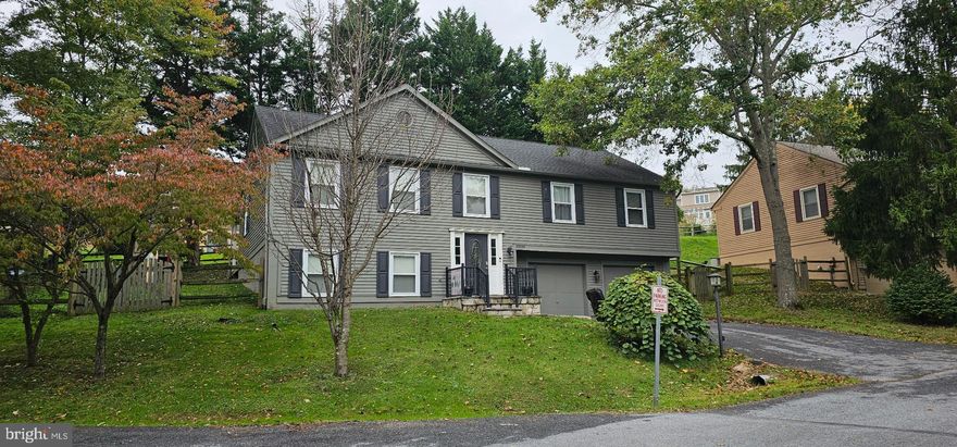 Every day will feel like a staycation in this solid and spacious 4-bedroom, 3-bath split-foyer home in the sought-after Lake Linganore community! Move-in ready with recent updates, yet offering room for your personal touch, this home features an open-concept kitchen, dining, and living area flooded with natural light. The kitchen shines with newer stainless-steel appliances, updated Kohler sink and faucet, center island, and ample cabinet space. The upper level hosts a primary suite with attached bath plus two additional bedrooms and a full hall bath. The finished lower level includes a 4th bedroom, 3rd full bath, and bonus flex room. Outdoors, enjoy an amazing entertaining space with an expansive partially covered deck with ceiling fans, a paver patio, and a fenced yard. Additional highlights include a 2-car garage, driveway with room for 2 extra parking spaces, and quiet cul-de-sac location. A wonderful home in a vibrant community with lakes, beaches, trails, pools, and more!