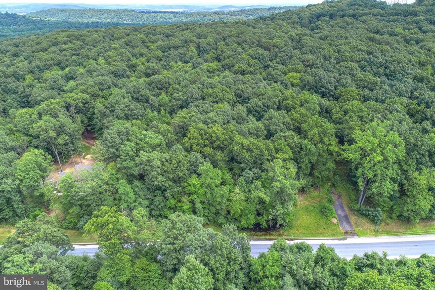 6 Lots remain in Heritage Woods-Gorgeous wooded building lots ranging from 3-15 acres. Bring your own builder or use ours to build your dream home. The community has minimal covenants/restrictions-enough to protect, but perfect for the hobbyist. Located 1 mile to river and 2 miles to RT 30, Hellam Exit. This lot is 3.28 acre lot with 100' of paved drive.