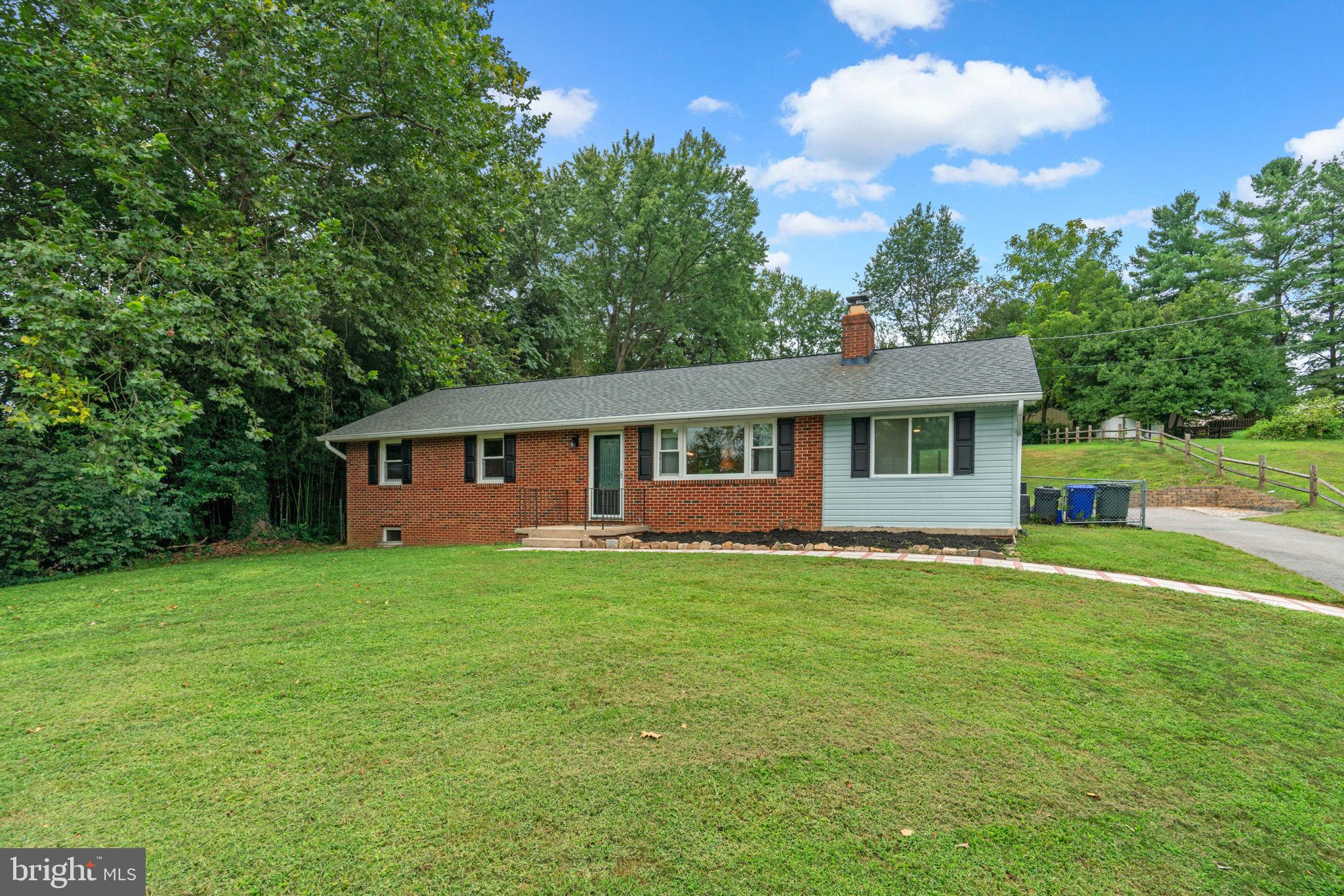 Beautiful home on over half an acre! This home has 4 bedrooms and 3 full bathrooms. Large kitchen and dining room on the main level. 3 bedrooms and 2 full bathrooms on the main level. 1 bedroom and 1 full bathroom on the walkout lower level. Lower level has separate kitchen and rec room. .65 acre lot! New roof and HVAC. Don't miss this one!