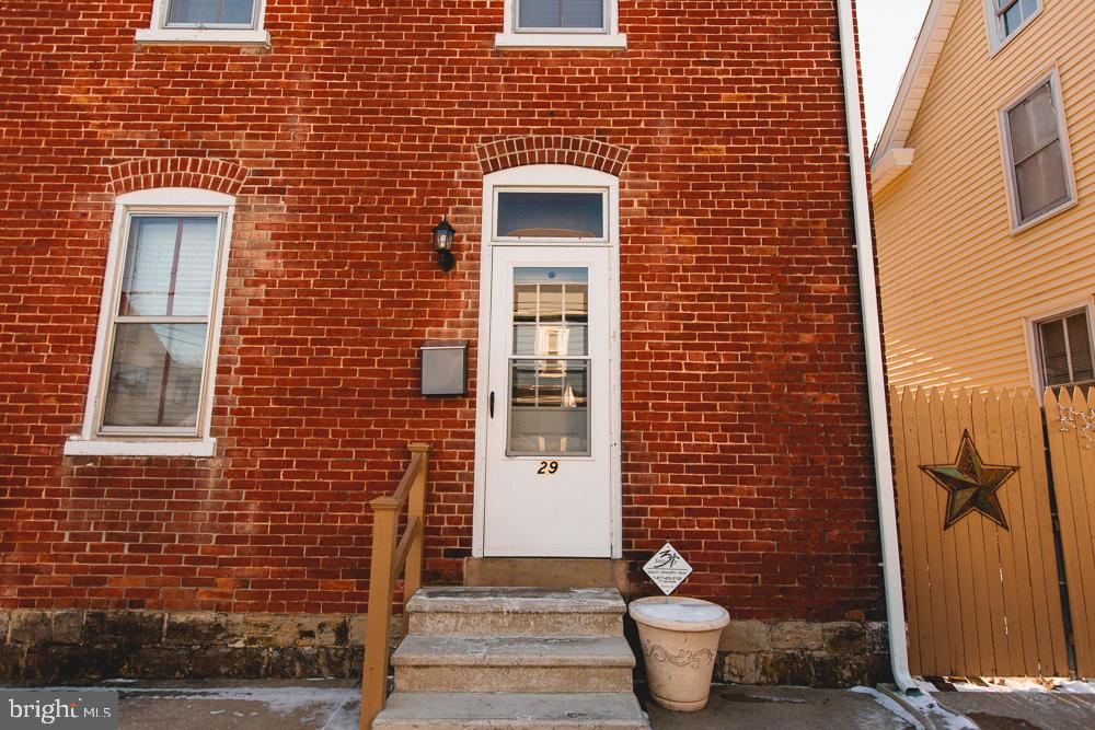 ''Move-in'' ready is an understatement! Remodeled from roof to basement and rock bottom utility costs! All new kitchen, new gas furnace, new roof, fresh paint, tankless hot water heater, new bathroom, new flooring throughout, finished 3rd floor bedroom w/ recessed lighting, new back deck...MUST SEE.