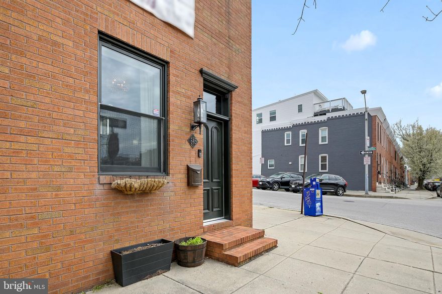 14 FT WIDE END OF GROUP CHAP RENOVATION LOCATED IN THE HEART OF CANTON! Extremely low taxes with a few years left on CHAP. This home boasts over 2,000 finished sq footage. Glistening hardwoods cascade throughout. Enjoy custom cabinetry, imported tile, marble countertops, designer lighting, and SS Bosch appliance package in the custom Chefs kitchen. Tons of natural light. High ceilings. Walk-in closets. First-floor office or workout room. Finished lower level with plenty of storage, full bath, and a custom wine cellar. 3 bedrooms are located on the second level. Easy access to a large rooftop deck from the hallway which is perfect for entertaining. Private parking pad. Close proximity to retail shopping, local dining, Patterson Park, Canton Water Front, and easy access to all major highways. Schedule a private tour today!