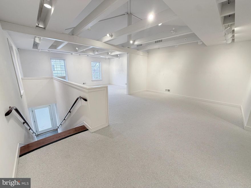 Amazing office or gallery space available above Evergrain Bakery in Chestertown's Historic District. Utilize the foot traffic or convenient central location to fulfill your business goals. A bathroom and multiple working spaces make this a versatile layout ready for your vision. Accent details designed by Vicco Von Voss. This space has recently been utilized as art exhibition gallery and most recently as a business office.