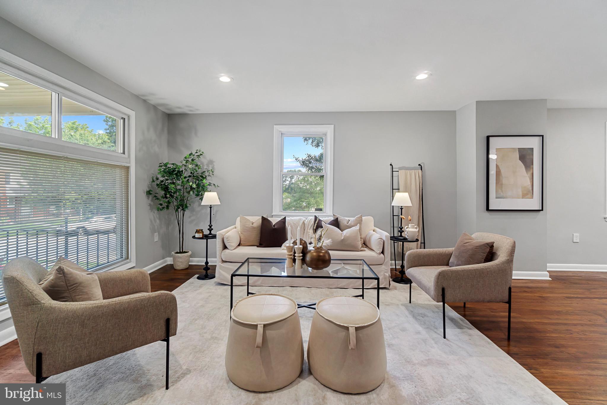 Welcome home to this beautifully updated end-of-group townhome in sought-after Baltimore County! Step inside to find gleaming true hardwood floors, recessed lighting, and fresh neutral paint that create a bright and welcoming atmosphere throughout. The kitchen features stainless steel appliances, crisp white cabinetry, and ample space for cooking and gathering. Upstairs offers three spacious bedrooms and 2.5 baths. The fully finished lower level includes a built-in bar — perfect for entertaining or relaxing — and leads out to a private back patio with a partially fenced yard, ideal for outdoor enjoyment. Come check out this home today!