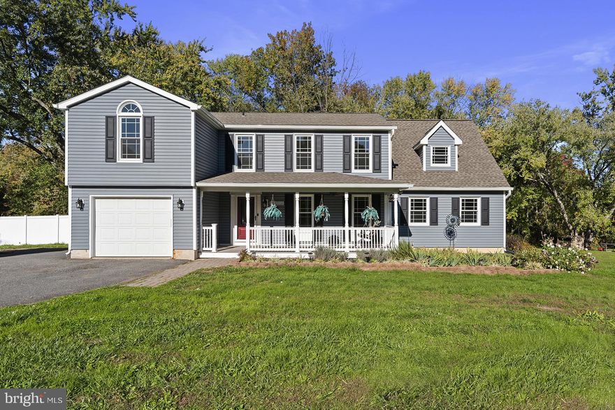 This six-bedroom, three full and one half bath property in Charlestown offers an array of modern updates and amenities with over 3,000 sq feet of living space on almost an acre of land with public water & sewer. This home is 100% move-in ready with all the updates. New carpet and fresh professional paint throughout. New Siding in 2022, New front door and two new sliding glass doors in 2021, Luxury vinyl plank flooring throughout the first floor in 2019, Total kitchen remodel in 2019, all windows replaced in 2019, New Roof and gutters in 2017, 1 HVAC system replaced in 2017 (both HVAC systems services July 2023 by Level w/a one-year service plan that transfers to new owner with two additional services between seasons). This gorgeous home offers ample parking and a relaxing front porch. As you enter the home, you'll notice the spaces are highly flexible and can be used for the homeowner's needs.  As you enter, to the right is a family room connected to another space/den, which leads to a 1st-floor bedroom or office space, a main-level laundry room, a spacious new galley style kitchen with white cabinets, granite countertops, and stainless appliances.  This space has a gas fireplace, dining room, and sliders to the finished all-season sunroom that provides a sunny, bright, flexible space to enjoy the backyard views. There is also a half bath on this Level and inside access to the garage. Heading upstairs at the top of the stairs to the left is the spacious primary bedroom suite with two large walk-in closets, closet organizers, and a full private bath.  There are four additional generously sized bedrooms with two full baths.  Heading to the basement is a finished room ideal for a craft room, office, or playroom.  The rest of the basement is unfinished and provides ample storage, utilities, and a man door with walk-up stairs to the bilco doors.  There are two HVAC Zones and a 200 amp electrical panel with a 100 amp sub panel.  The backyard is private and lush with mature trees.  A composite deck, a paver grilling entertainment area, and a fully fenced backyard offer a secure space for outdoor activities.