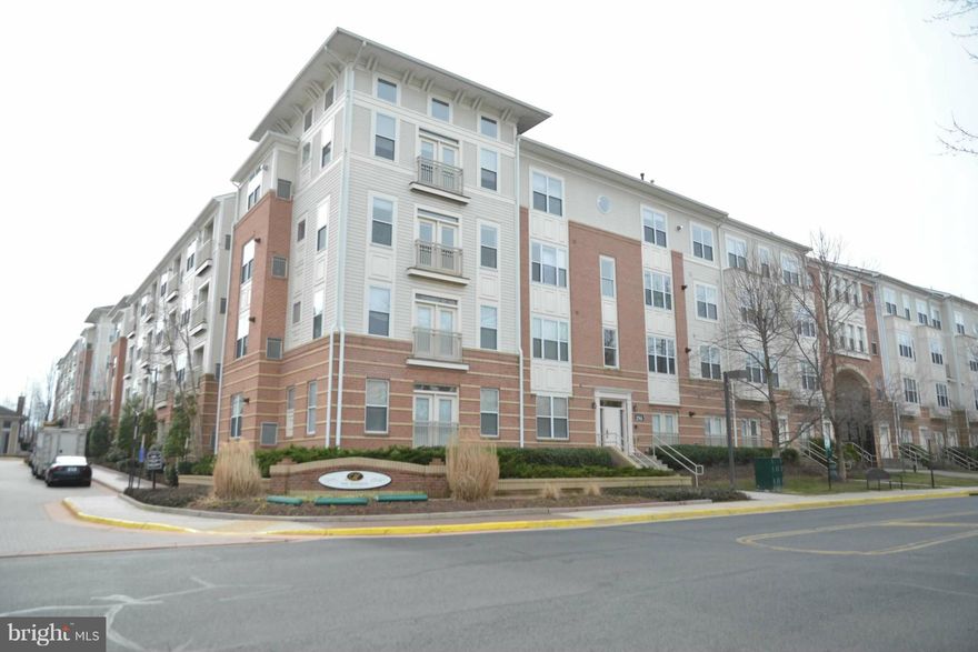 TWO BLOCKS TO METRO! WOW FABULOUS NEWLY RENOVATED CONDO!! Open floor plan!! Freshly Painted, New Laminate Floors, New Stainless Steel Appliances, New Granite counter tops in kitchen & bath, New Light fixtures, Faucets and Ceiling Fans. Washer & dryer in unit. Many building amenities including pool, indoor basketball court, gym, media room, virtual golf, business center, lounge and billiard room.