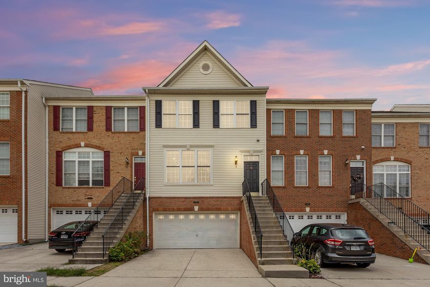 Incredible opportunity to own this stunning, updated town home on a quiet loop in sought after South Riding. Kitchen and all Bathrooms have just been fully renovated. New luxury vinyl plank flooring on all three level. Abundance of recessed lighting throughout that you will not find in most homes! Fresh paint throughout the entire home. Bright and open floor plan.  Renovated Kitchen with newly painted white cabinets, stunning quartz counters, chic subway tile backsplash, center island and new sleek black appliances. The Kitchen gives access to the gorgeous deck overlooking trees for privacy. Family Room off the Kitchen boasts a cozy gas fireplace. The upper level hosts three Bedrooms and two full renovated Bathrooms including the Primary Bedroom with vaulted ceilings, a walk in closet and an En Suite Bathroom with a soaking tub, updated dual sink vanity with quartz counters and walk in shower. The lower level of the home offers access to the two car garage, a third full renovated Bathroom, and an expansive Rec Room that walks out to the patio and back yard. Fantastic location! Just a short walk to pools, schools, walking paths, tot lots and close to shopping, restaurants, cafes, fitness centers, commuter routes (50, 28, 7, Dulles Greenway), and Dulles International Airport. Make this beautiful property your new home today!