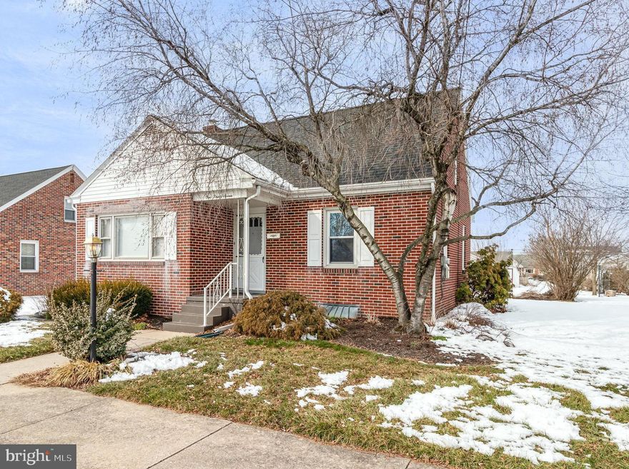 Welcome home to this charming brick home located in the heart of Palmyra Boro. The spacious living room is bright and inviting, with built-ins and freshly refinished hardwood floors, leading to the kitchen with ample solid wood cabinetry with dining area.  The first floor offers two nice sized bedrooms with hardwood flooring and generous closet space. The 3rd bedroom and separate loft area, perfect for an additional sitting area or office space complete the second floor.  The lower level is partially finished, with additional cabinetry, laundry, and utility room.  Step outside onto the covered porch, there you will find a wonderful backyard and covered patio area perfect for outdoor enjoyment, as well as the two car detached garage and separate storage shed.   This property has been beautifully maintained, and is in excellent condition.