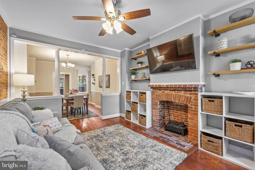 Welcome to 1216 William Street, where charm and spaciousness converge in the heart of Federal Hill. As you step through the entrance, you'll be welcomed by an inviting living room, an elegantly appointed dining room, and a galley kitchen adorned with a striking backsplash and gleaming stainless steel appliances. A full bathroom & laundry complete this level. Outside a private rear patio provides the ideal entertaining space.
Character permeates every corner of this home, from the exposed brick walls to the original hardwood floors and the custom moldings, creating an atmosphere of warmth and timeless style.Upstairs on the second floor, generously sized bedrooms await, along with a centrally located bathroom. Storage is abundant, thanks to the large hall and bedroom closets. Ascending to the third floor, you'll find the primary suite, featuring a spacious bedroom, plentiful closet space, and an en-suite bathroom for your comfort and privacy. From the third floor, step onto the spectacular rooftop deck, where sweeping views of captivating Baltimore await, providing an ideal setting for relaxation and entertaining. This exceptional residence is conveniently situated just a few blocks from the renowned Cross Street Market and all the attractions that Federal Hill has to offer. The best of the city is at your fingertips, making 1216 William Street the perfect place to call home. Schedule a viewing today and discover the charm, comfort, and convenience it has to offer. Your dream home awaits!