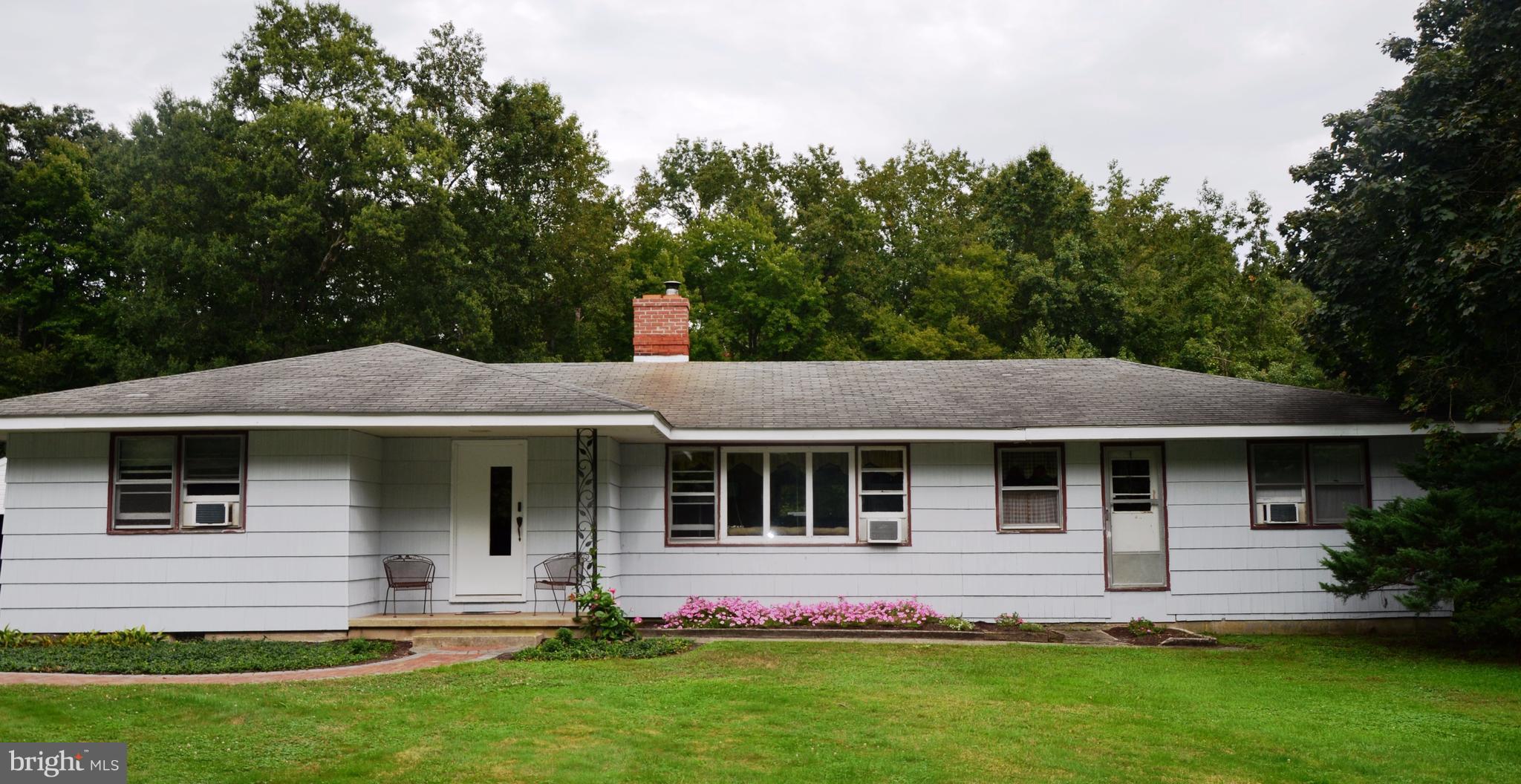Land Area 1.24 acres New Electric Hot Water Heater 2nd Bath can be easily added in laundry Wood Stove (includes insulated stainless chimney liner)WoodshedGarage includes oil changing pitNewly remodeled laundry/mudroomWater treatment system includes reverse osmosis, softner, neutralizer