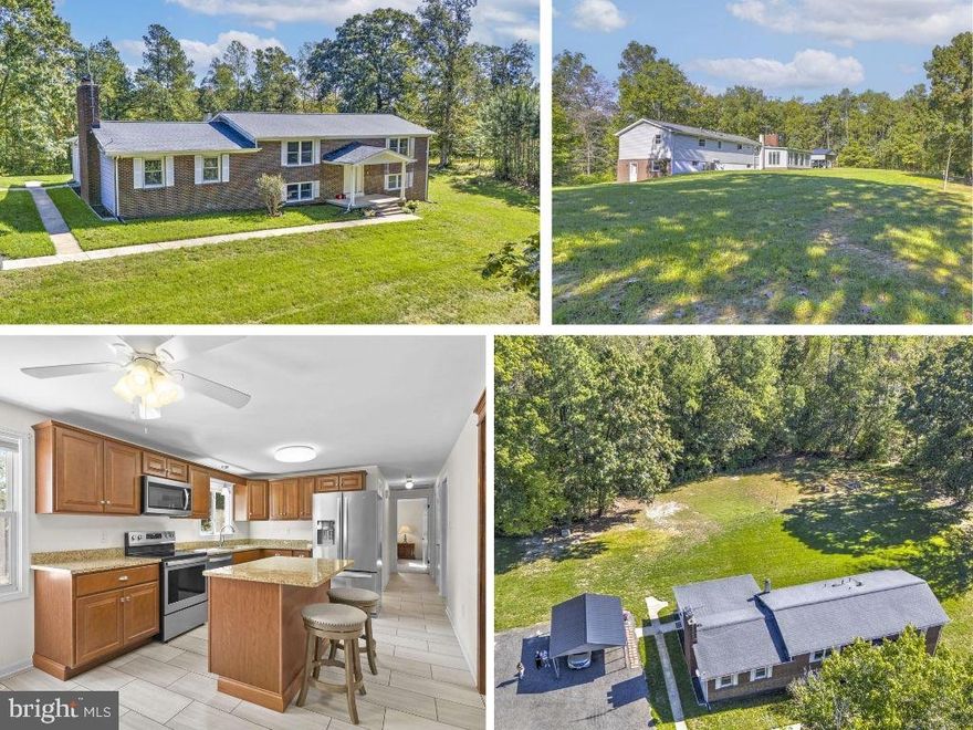 Nestled on 29.5 acres of serene, wooded privacy, this exceptional estate offers a rare blend of character, modern updates, and endless potential. Inside the 2,700+ sq ft home, you’re welcomed by distinctive features like a striking cedar beam and dual staircases that add warmth and architectural charm. The spacious kitchen is a standout, featuring granite countertops, stainless steel appliances, tile flooring, and abundant cabinetry—perfect for both everyday living and entertaining.

The home offers generously sized bedrooms, an updated guest bath, and a luxurious owner’s suite complete with a walk-in closet and a beautifully renovated en-suite with floor-to-ceiling tile and a walk-in shower. The main level provides multiple gathering spaces, including a formal dining room, a large family room, and a unique all-season room filled with natural light.

The finished basement expands your living space with a cozy wood stove, three additional bedrooms, and a fully updated bathroom—ideal for guests or flexible living needs. Outside, two open field areas offer endless opportunities for recreation, gardening, or even horses, while the detached workshop with its own 200-amp service is perfect for hobbies, storage, or projects.

With major updates including a newer roof, HVAC system, well pump, and hot water heater, this home offers peace of mind along with its natural beauty—all just minutes from shopping, dining, and Pax River.