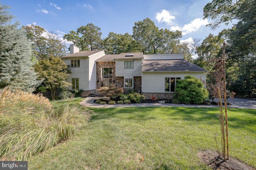Welcome to 820 Weadley Road in Wayne, Tredyffrin Township. An inviting front walkway framed by mature plantings creates a warm welcome as one enters this 4 Bedroom,  2 full and 1 half Bathroom contemporary home with traditional charm offering a wonderful flow, natural light, and versatile living spaces inside and out. A striking two story Foyer sets the tone and opens into a spacious Living Room with hardwood floors and a wood burning fireplace, ideal for both relaxing and entertaining. The Dining Room, also with hardwood floors, features a slider to the expansive Trex Deck seamlessly extending the living space outdoors. The heart of the home is the fabulous open Kitchen, designed with sleek cabinetry, quartzite countertops, stainless appliances, a pebble stone backsplash and two islands- one for prep and the other as a casual eat in area also with hardwood floors.  A slider in the Kitchen provides easy access to the Deck, creating a perfect flow for gatherings. The step down Family Room is warm and inviting while showcasing a vaulted ceiling with a loft overlook, a gas fireplace with a striking stone surround and a slider to the Deck.  The conveniently located Mudroom is right off of the Garage with a Laundry Area to complete the main level.
Upstairs, the spacious Primary Suite offers a vaulted ceiling, large walk in closet with custom shelving and an updated Bathroom featuring a skylight, shower with a frameless door and a double sink vanity. Three additional Bedrooms provide flexible and spacious living. The updated Hall Bathroom features an oversized shower and modern dual sinks.  The versatile Loft is perfect for a second office or reading nook and overlooks the Family Room below, adding to the home's open and airy feel.
The finished lower level expands the living space with neutral carpeting, a workout area and ample storage. A slider opens to an area beneath the Deck, providing easy access to the fully fenced backyard. The outdoor spaces are equally impressive. The Trex Deck extends the entire length of the back of the house, overlooking a fully fenced, flat backyard, ideal for play, entertaining and gardening. A designated vegetable garden has been reimagined as a perennial garden, adding charm and color to the landscape. An added bonus is  a whole house Generator!
This home has been meticulously maintained.  It is a rare find in a superb location- close to the train, major roadways, and the shops and dining in  the town of Wayne with easy access to the King of Prussia Mall  plus located in the award wining Tredyffrin Easttown School District.  Offering contemporary design, timeless comfort, and unbeatable convenience, 820 Weadley Road is the perfect place to call home!