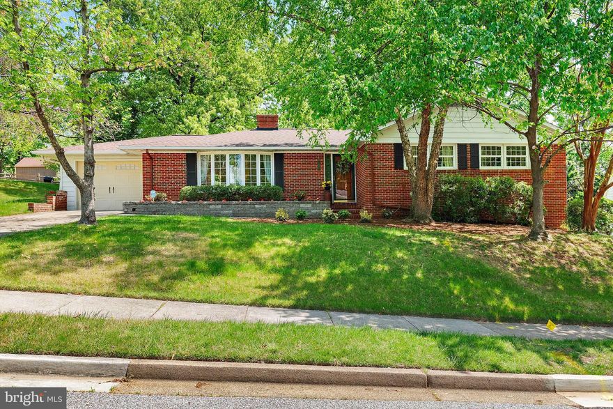 Welcome to 5904 Linthicum Lane, a spacious and beautifully maintained home nestled on one of the most picturesque streets in the sought-after Twin Oaks neighborhood.
Set high above the street, this five-bedroom, two-and-a-half-bath home offers exceptional privacy and a generous layout—perfect for a growing family. The large, fenced backyard backs to wooded, open space, providing a peaceful, natural backdrop.
Inside, you’ll find hand-troweled walls, new carpet, ceramic tile floors, and tasteful updates throughout. Big, beautiful replacement windows (2010) fill the home with natural light and enhance its inviting flow. The Tuscan-style kitchen is a standout, featuring an imported Italian stone mosaic backsplash and a 5-burner gas stove—ideal for home chefs and entertaining alike.
Unwind in the cozy living area with a gas fireplace or step outside to dine alfresco on the elegant paver patio, perfectly shaded for relaxing summer evenings.
The lower level has been thoughtfully renovated into a luxurious primary suite with a walk-in closet, sitting area, and French doors opening to the lush backyard. An adjacent lounge provides a quiet spot for reading or watching TV, while a spacious family recreation room is perfect for movie nights and playtime.
With its abundant space, quality craftsmanship, and prime location—just minutes from BWI and 7 miles from the University of Maryland Medical Center, downtown Baltimore and I-695—this is a true forever home.
Don’t miss your chance to make this Twin Oaks home your own—schedule your private tour today!