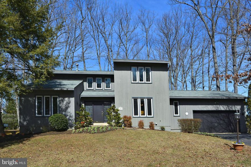 PRICE REDUCED Great location & value, low $/sq ft. Metro & toll road access from neighborhood. Rural feel yet 3+ miles to Tysons for shopping, dining & entertainment. Corner tree lined cul-de-sac lot. Lg kitchen w/granite, eat-in space, open to family room & deck. Master retreat on 1st floor w/access to 2nd deck & hot tub. Finished basement w/home theater, full bath, office & workroom. HOW policy