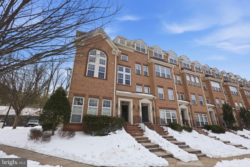 This BEAUTIFUL garage townhouse-style condo offers 3 bedrooms and 2.5 baths.  This spacious upper level unit has been freshly painted throughout.  Open concept living, large family room with crown molding and plantation style shutters. Additional option for formal dining area.  9' ceilings on this main level.  Gourmet kitchen offers ample cabinet space, granite counters, breakfast bar,  tile backsplash, new fridge 9/25, and newer double wall oven and dishwasher.  Updated LVP flooring. Filled with light from the dual French doors that lead to large balcony with wooded views.  Off the kitchen is perfect for a large table, or option for a combined table area and sitting room with new ceiling fan.  Upstairs offers 2 nice sized secondary bedrooms with a hall bath.  The large primary suite offers a walk-in closet with an additional double door closet and a new ceiling fan.  Enjoy morning coffee watching the sunrise off the private balcony.   Luxury bath with dual vanity, separate shower and soaking tub.  Additional improvements include black handles/hinges throughout the home, NEW gas furnace and blower 9/25, A/C was replaced and upgraded in 7/18, NEW hot water heater 9/25,  garage door opener 9/25 -- Not to mention the location! Tucked back in the neighborhood, not a through-street, extra parking, surrounded by trees and mature landscaping. All this in the heart of Manassas Park with easy access to restaurants, shopping, medical facilities, parks, walking trails, and Old Town Manassas and the up-and-coming Manassas Park. Plus a commuters dream with multiple commuting routes and easy access to the VRE, just too much to list it all!