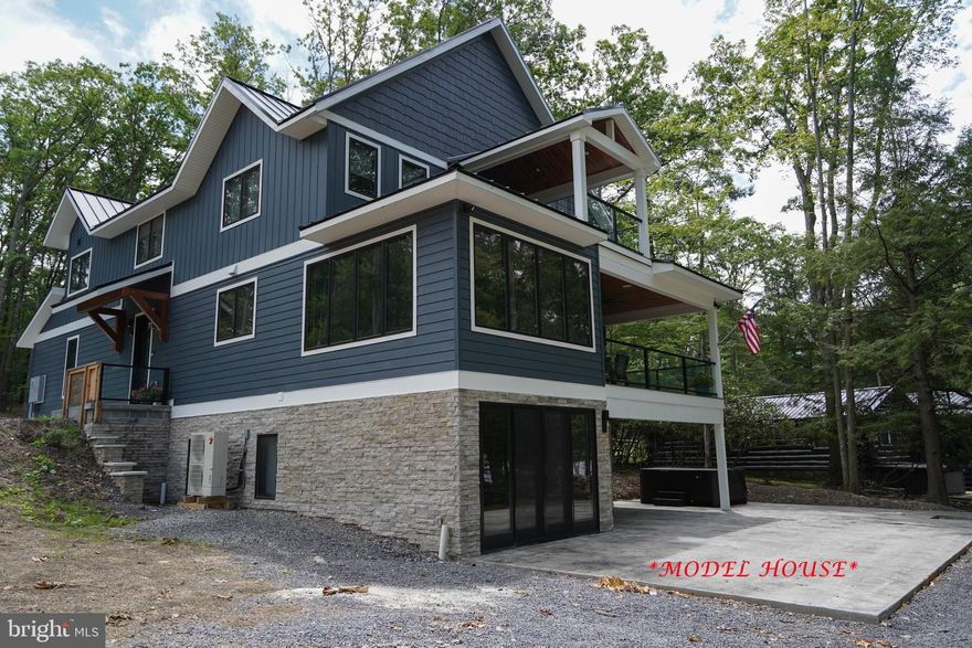 Construction to begin at settlement on this completely custom 5 bedroom, 3.5 bathroom lakefront home offering over 4700 square feet on a premium, 1/2 acre lakefront lot with 62' of lake frontage and 1 dock slip at a 2-slip common dock. Enjoy level lakefront with panoramic views and western exposure. Open main level layout that flows from foyer to living room, kitchen and dining that overlooks the lake through custom windows. The home pictured is a model home and is used to showcase the future home at 849 Glendale Road. Shared driveway entrance from Glendale Road. Call today for a private tour of this fantastic property!