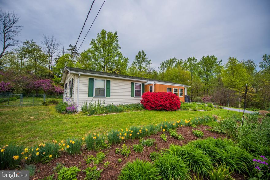 Love gardening...this is the place? Don't  garden just mow them down! Beautifully landscaped 2+ acre lot on state maintained road just outside  Inwood WV and only minutes to Winchester VA.  Well maintained in and out this 3 bedroom home offers a possible future guest cottage with water & basement.  This space would make a great workshop or home business base.  Family room + a recently enclosed porch area. Pride of ownership shows here. GPS will get you lost so follow Rt45  towards Glengary just past the big red brick church on left..the home is on the right. Survey will be in view doc section of the MLS.