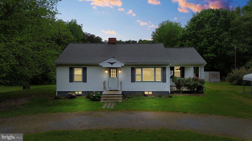 Welcome to your charming retreat at 7166 Fredericksburg Turnpike. This delightful Ranch style home, built in 1959, boasts 1,056 finished square feet on the main level and offers a cozy living space with 2 bedrooms, 1 bathroom, and a study/office. There is an original oak hardwood flooring under carpeting in living rooms, study and bedrooms. Kitchen and bath could use some updating. Completely open 936 sq. ft. basement with concrete  flooring, lighting and a cast iron wood stove capable of heating the entire home. Basement space can be fully finished. Siting on a generous attached 1 +acre wooded parcel. Enjojy peaceful surroundings conveniently located near Spotsylvania VRE, Southpoint Shopping Center, and Spotsylvania Regional Hospital, and downtown Fredericksburg, offering easy access to shops, dining and entertainment. Plus, just 10 minutes from Dominion Raceway and the new Kalahari Waterpark Resort & Conference Center. Also, just 30 minutes from the new Carmel Church Business Center, a 325,500 SF Class A distribution facility and Kings Dominion and 55 minutes to downtown Richmond.