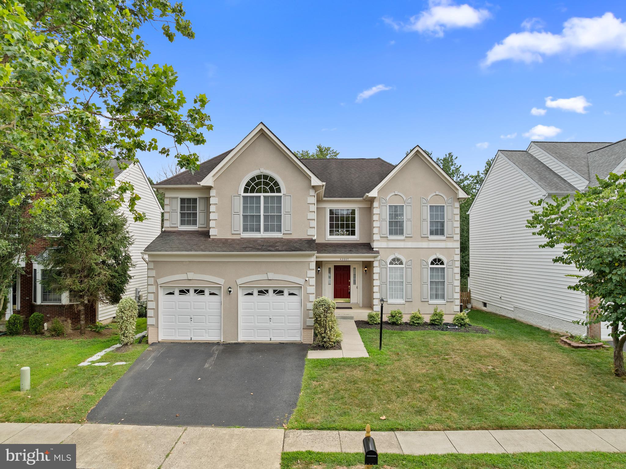 Welcome home to this stately, elegant home in South Riding. This home is a rare gem—elegant, spacious, and perfectly located in one of Northern Virginia’s most sought-after neighborhoods. Whether you're looking for room to grow or a refined retreat, this property delivers.
Enter into the foyer with a soaring high ceiling that surrounds the main level with lots of natural light. The living and dining area offers open living space, the kitchen has an eat-in table space, and access to the back private deck. There is an office on the main level. The family room has a floor-to-ceiling stone fireplace that brings coziness to winter evenings, and where everyone can gather around and be together.
Dramatic entry to the Upper Level, ascend the striking dual wooden staircases--a stunning architectural centerpiece that offers two elegant paths to the upper level. At the top, discover a grand owner's suite designed for comfort and sophistication, featuring: Two expansive walk-in closets, 2 vanities with generous counter space, a separate shower, and a luxurious soaking tub.
Upper-Level also features: Three full bathrooms for ultimate convenience; A private guest suite and 2 spacious bedrooms with abundant storage.
The lower level offers 2 bedrooms rooms and 2 full bathrooms, plus a kitchenette, 2nd family room. Large storage space with wooden shelving.
This home is ready for its new owners, where you can begin making new memories and enjoy coming home!