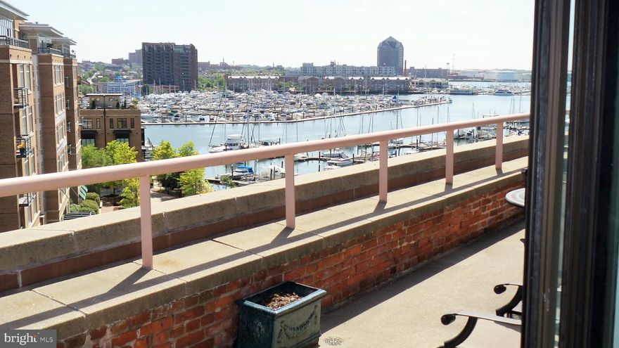 Visit this historic Fells Point waterfront two-level, one-bedroom updated penthouse condominium with a private 33' terrace, and attached garage parking. The Private 33' terrace offers sweeping harbor/water and city views. The condominium showcases an open floor plan with exposed brick walls, a large living room and dining room combination, wood burning fireplace, and hardwood floors. The gourmet kitchen has stainless steel appliances, granite countertops, and a breakfast bar. The entry-level also has a half bath and a separate laundry room. The second-floor master bedroom suite has a master bath w/ jetted tub & stand-up shower.