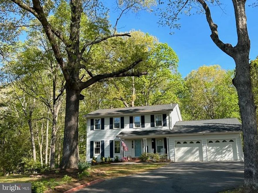 Welcome to 114 Autumn Drive. Sitting on 1.5 acres, this 3,000 sqft colonial welcomes you home. Upon entering through the front door on the main level, the formal living room is a blank slate for you to make your own with a newer coat of paint. From there, the formal dining room is filled with natural light. Through the doorway, you'll find the kitchen studded with stainless steel appliances and an island, making it a great space for everyday meals or special occasions. Step down into the living room, where the brick fire place and built ins are sure to catch your eye. Great for a cozy night at home or entertaining. Upstairs you will find the primary bedroom with closet and ensuite bathroom as well as three additional bedrooms and another full bathroom. Downstairs in the basement, you will find a large open flex space lending itself to the possibility of in home gym, in home office! There is also another full bathroom and NTC 5th bedroom in the basement for guests to have their own private space or even in home storage . The basement also is a full walkout with easy access to the beautiful yard. The privacy of the 1.5-acre lot is the cherry on top. Fenced and tree-lined, this backyard gives a great retreat after a long day and is a great open area for activities or entertaining. Start your next chapter here!