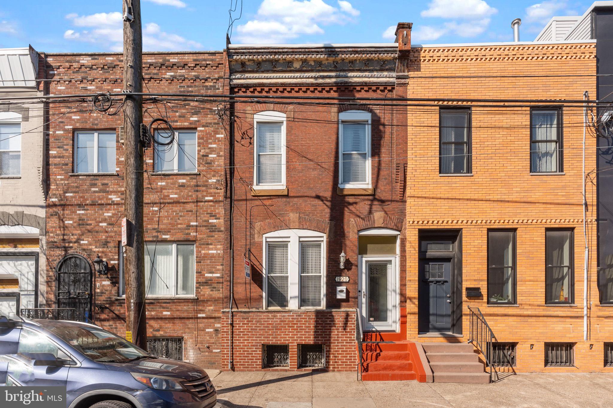 Large South Philly row featuring living room, spacious dining room, large eat-in kitchen and door to rear fenced in yard. Large basement with laundry area and storage space. Upstairs you'll find 4 spacious bedrooms and a fully renovated tiled bathroom. New roof installed in 2024. Great street with great neighbors. Large home with 16x70 lot. Hurry!! Will not last!
