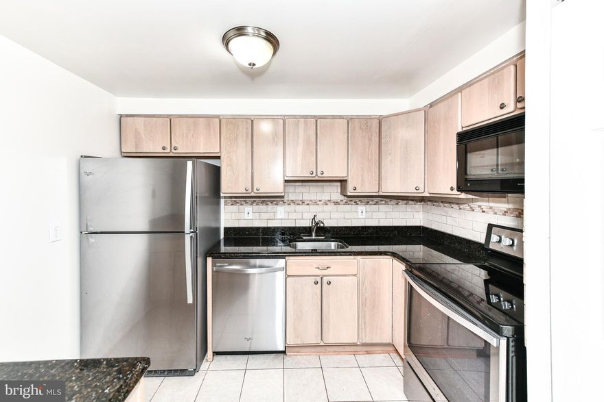 First Floor End-Unit 2BR, 2BA in excellent location of McLean*Light & bright unit with large open living room featuring chair rail & crown molding*Updated kitchen featuring granite counters, complementary backsplash, ample cabinetry & stainless steel appliances with tiled floors*Two nicely sized bedrooms with updated, tiled full bathrooms*Laundry area with side-by-side washer & dryer*Round the clock security in this gated community features a club house, lighted tennis courts, outdoor pool, basketball & tennis courts, playground, fitness center & so much more! Walk to new Silver Line Metro! Home is conveniently located condo is less than 1 mile away from McLean Metro Station and Safeway food market, 1.5 miles away from both Tyson Corner shopping malls and several restaurants, and much more! The Colonies in McLean sits on 29-acres of land! $400 move in fee paid to condo association for weekend move ins*$200 move in fee for weekday move ins*1 assigned spot: Garage Space #102*Extra Storage provided for tenant next parking spot*NO CATS*