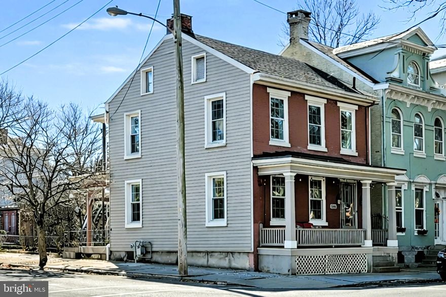 This beautiful historic home is move-in ready with tall ceilings & original millwork. The remodeled kitchen has stainless steel appliances & double cabinets. Efficient mini-splits & replacement windows ensure comfort. Outdoor living shines with a big composite deck & pergola (with lights/fan). A charming potting shed, wrought iron fenced rear yard, balcony, & valuable off-street parking await. First time buyer funds are available. Click the “virtual tour” to take an immersive 3D walkthrough.