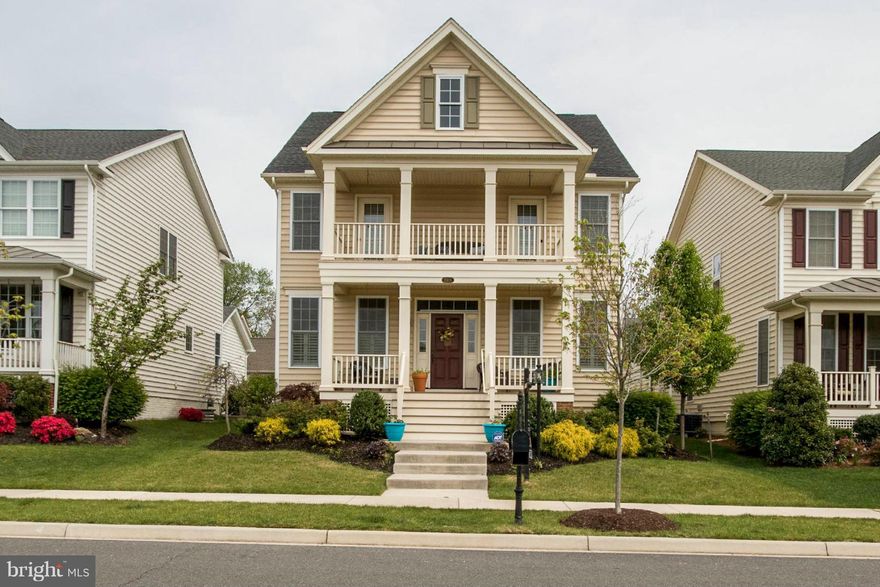 Putnam w/4,600+ fn sqft w/high end upgrades throughout! Porch & balcony off of MBR! Wood floors on main lvl & large MBR w/sitting room! Dream Chef's Kitch w/top of the line KitchenAid SS appl including range hood & wine cooler, elegant white cabinetry& granite! Extensive wood trim! Large BRs! Loft w/4th BR, BA & built-ins. Fin basement w/5th BR, BA & a huge rec room! Also for sale!