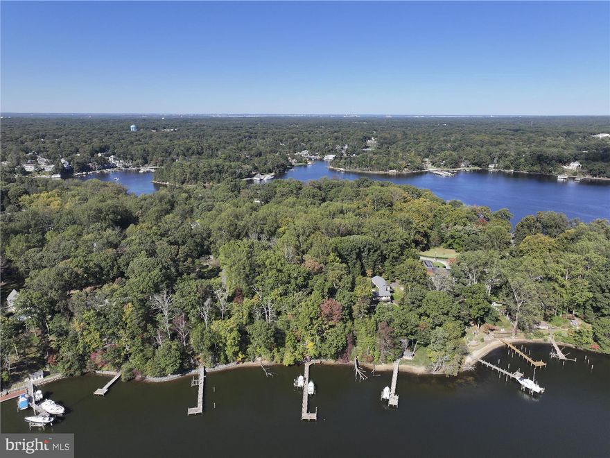 RARE OPPORTUNITY - Build your DREAM Waterfront Home on this 2.22
acre site that offers the perfect blend of privacy, convenience, and potential on Plum Creek just off the Severn River. The level lot is approved for a 3,200 sq ft home. Enjoy approximately 100' of water-frontage and deep-water access, all surrounded by mature trees and natural shoreline. Despite the serene setting, you’re just minutes from everything Crownsville and Annapolis have to offer—whether you
arrive by car or by boat. This lot just went through a minor subdivision and has been recorded in the land records for Anne Arundel County.  The Adjacent Lot (1001 Omar Dr) with 2.26 acres (MLS #
MDAA2129488) is also for sale. The Site plan is available for both lots upon
request.