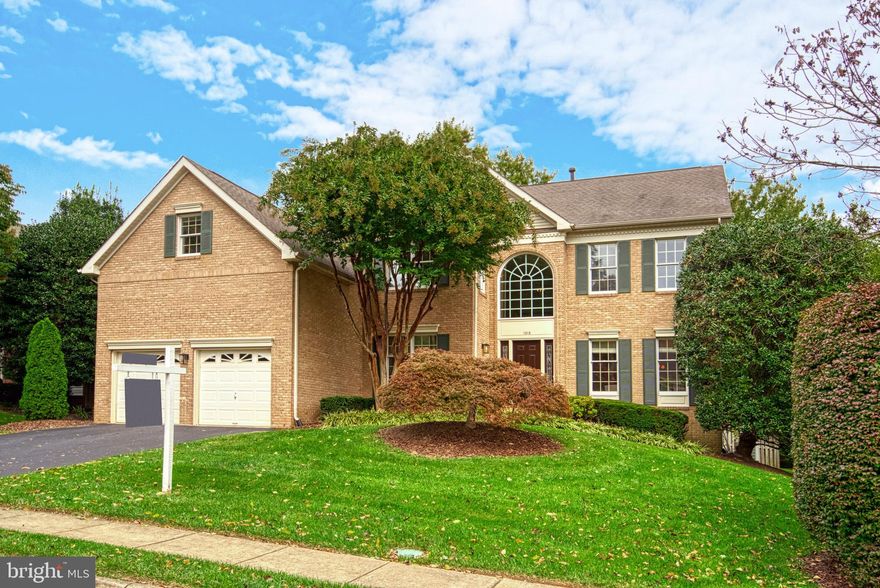 Absolutely stunning and move in ready home!  This gorgeous brick Colonial has been lovingly maintained and updated over the years.  The first impression as you walk into this home, the foyer is a wow!  Brand new hardwood flooring has been just installed on the main level. The two story staircase has iron railings and the entire home has been recently painted.  The French Doors off the foyer open to the main level library that has built in wood bookcases.  The gourmet kitchen is updated with custom shaker solid wood cabinets, stone countertops, backsplash & appliances.  The center island is the perfect place for food prep or to gather with guests. There is a bumped out breakfast area that opens to the grand family room with cathedral ceilings, gas fireplace and 2nd back staircase to the upper level.  One of the best features of the house is the super large custom screened porch that looks over the landscaped yard!  Feel like in your own private tree house resort!  To complete the main level,  the formal dining room and living room are spacious and bright!  The upper level has brand new carpets. The stunning primary bathroom suite has a separate sitting area and a room size closet with custom "closet by design" organizers.  The primary bathroom was completely remodeled a few years ago. It looks like an ad from a home design magazine! It has a glass shower, custom tile, dual vanities and free standing tub.  The upper level also has another ensuite bedroom with WIC, private bathroom and a shared bathroom in between bedrooms  2 & 3.   The amazing space continues to the lower level where you will find high ceilings through out.  There is an oversized recreation room,  media area and a bonus room along with a modern updated full bathroom with glass shower.  The double door to outside has just a few steps up to the fenced backyard. The yard is lusciously landscaped! The super convenient location is 2.3 miles from the Metro Station, Reston Town Center within 2 miles, and easy access to major routes, allowing for a seamless commute to Washington, D.C., Tysons, and Dulles. The Great Falls Crossing Community offers fantastic amenities, including a neighborhood pool, tot lot, basketball courts, and tennis courts, as well as walking paths that connect to Reston Paths, Lake Fairfax Park, the Watermine and Lake Anne.  OPEN SATURDAY & SUNDAY 1-3:00. during Reston Home Tour weekend, this is beautifully renovated home that can be yours!  You can look and buy!