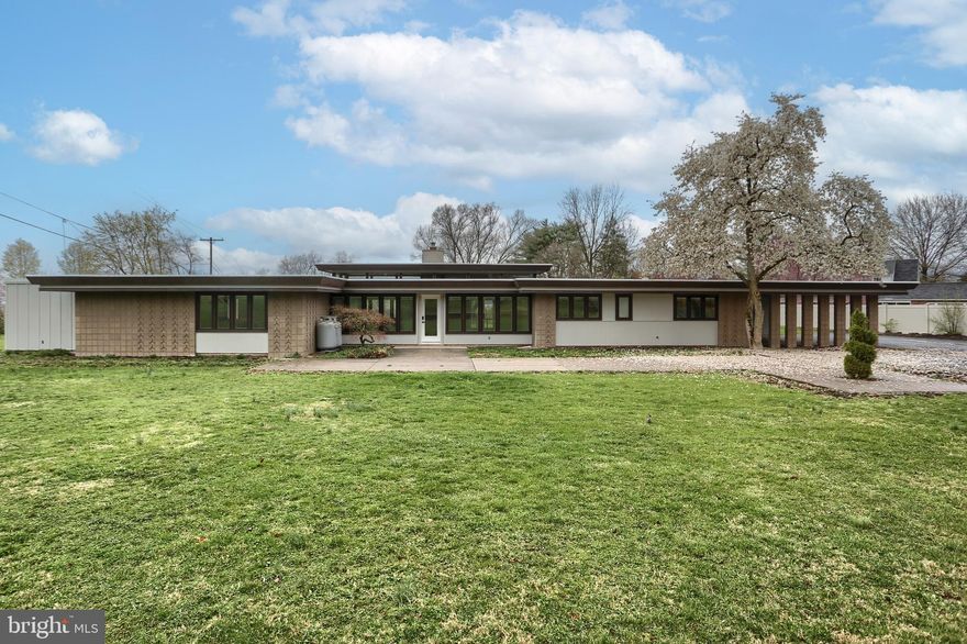 Welcome home to this beautifully renovated ranch, perfectly positioned on 2 serene acres with an abundance of natural light pouring in through expansive windows. Thoughtfully updated with modern finishes, this home offers both style and comfort in a tranquil setting.

Step inside to discover gleaming hardwood floors throughout the main living areas, an open-concept layout, and a gourmet kitchen featuring quartz countertops, new appliances, and custom cabinetry. The bathrooms are beautifully appointed with tile floors and walk-in tile showers, creating a spa-like retreat.

Relax in the living room by the cozy fireplace, or enjoy the versatility of the unfinished basement, which also features its own fireplace—perfect for future expansion or extra storage. The bedrooms boast brand-new carpet, providing warmth and comfort.

This home is equipped with two efficient heat pumps, one with a propane backup, ensuring year-round comfort. Additional updates include a new Rinnai hot water heater.

Outside, unwind on the screened-in porch overlooking the scenic backyard, offering the perfect space to enjoy your morning coffee or entertain guests.