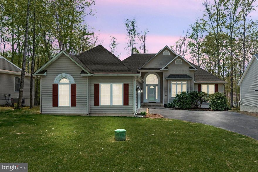 Welcome to 118 Monticello Circle in the Lake of the Woods neighborhood. This newly remodeled home has three bedrooms, two baths, and an open floor plan. It includes an oversized two-car garage and extra side-yard parking. The fresh paint and shining floors create a bright and inviting atmosphere in most rooms. The living room features a gas fireplace, while the formal living room offers versatile options such as an office or playroom. The kitchen boasts a gas range, ample lighting, custom cabinetry, and a hammered copper farm sink. The screened porch leads to a large rear deck, spacious backyard, and primary bedroom. The primary suite includes a luxurious bathroom with heated tile floors, a smart-controlled shower head, and a walk-in closet. Schedule your appointment today!