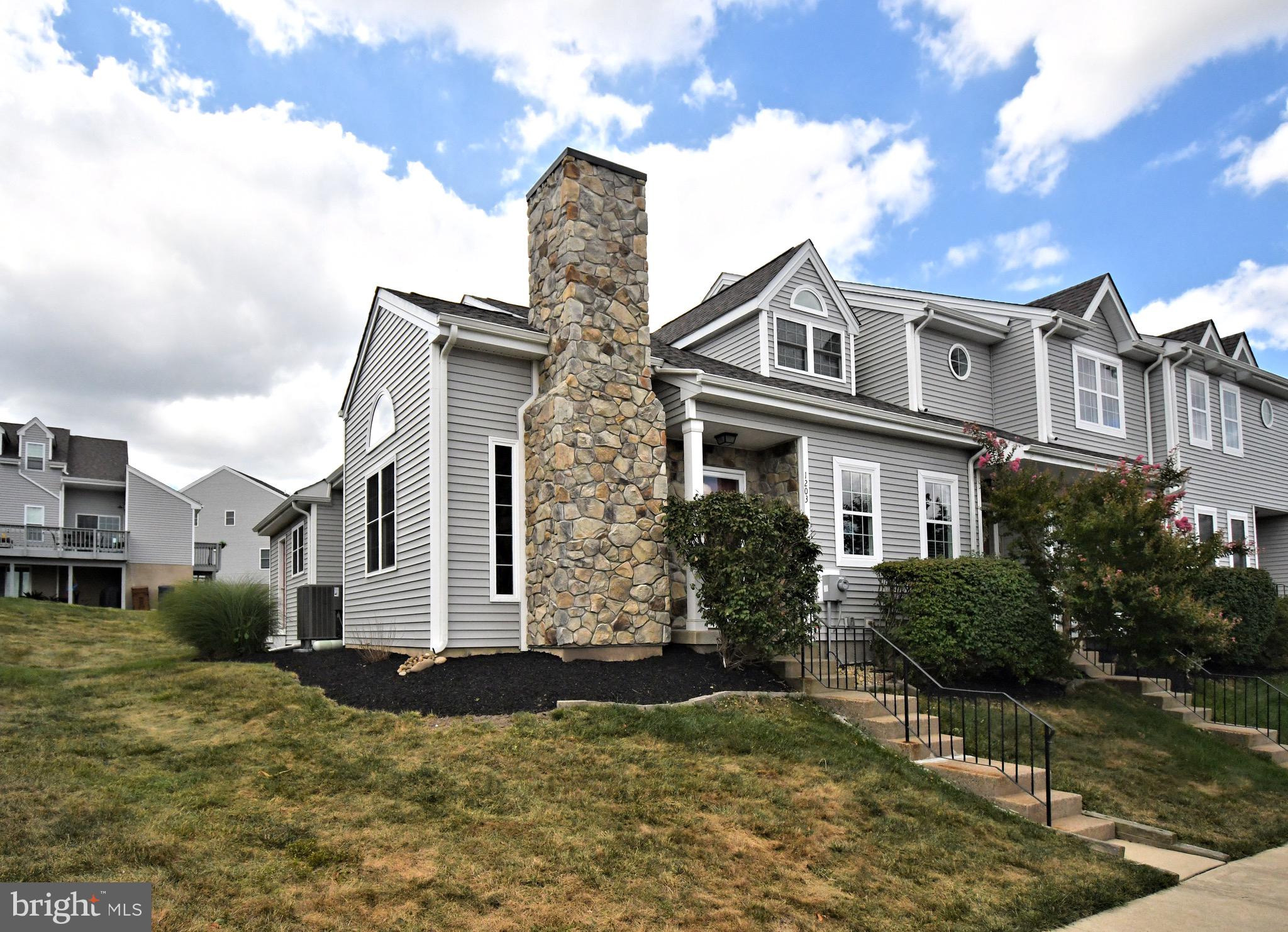 Welcome to 1203 Stuart Creek Farm, a like-new end unit with a unique layout in the highly rated Upper Dublin School District. The first floor offers an open-concept living space with luxury vinyl flooring, a fireplace, and a brand-new kitchen featuring granite countertops, stainless steel appliances, and a large island. Two bedrooms and a full bath complete the main level. Upstairs, the primary suite is a private retreat with a sitting area, walk-in closets, and a spa-like ensuite bath with dual vanities, soaking tub, and walk-in shower. A finished basement provides additional living space along with ample storage. Neutral colors and quality finishes throughout give this home a fresh, modern feel. Dedicated parking adds convenience, and the location is close to Ambler, restaurants, shopping, and major routes. Available Now, this is a 24-month lease.