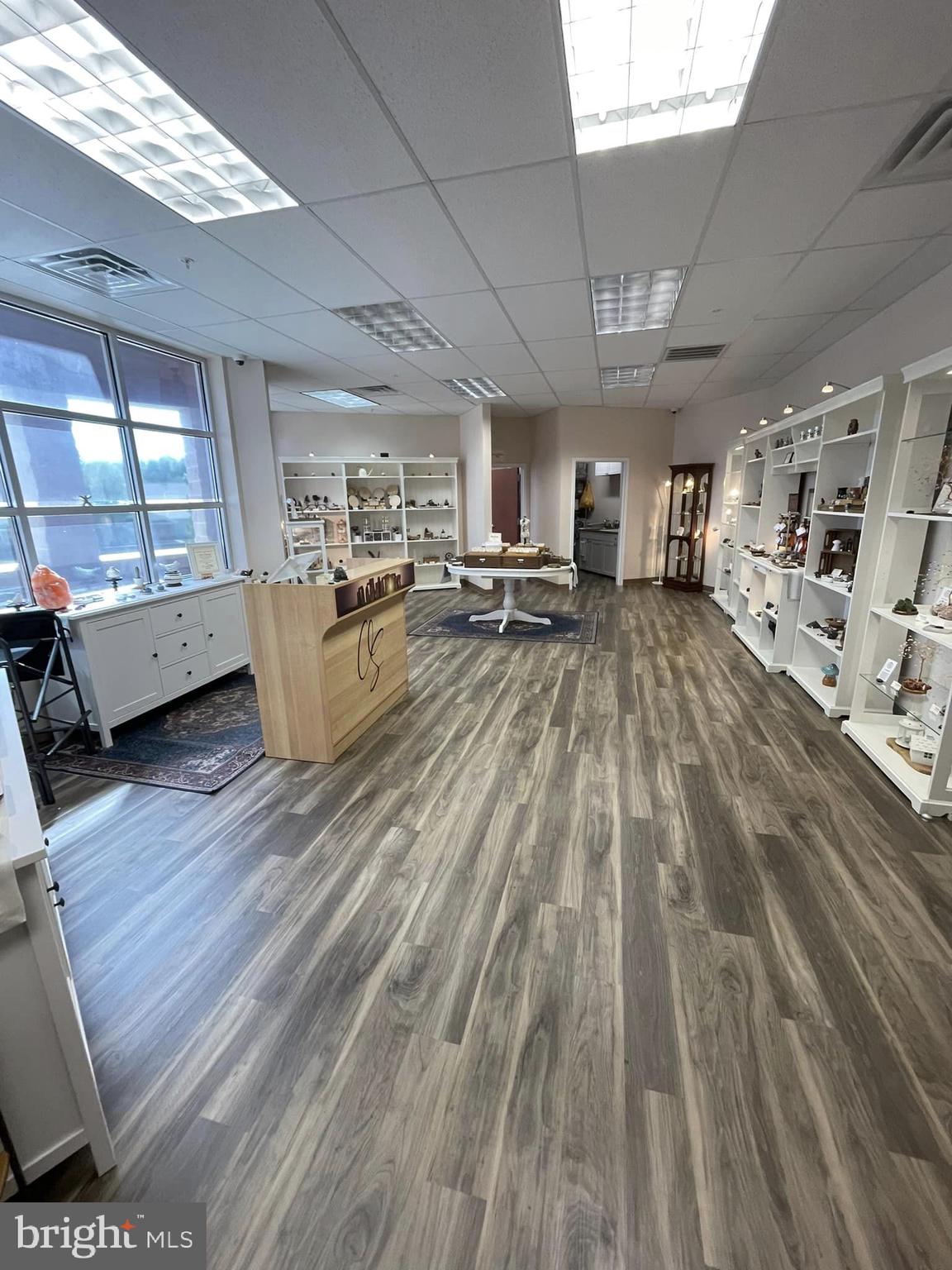 This Second Floor Elevator Accessible Highly Secure and Beautifully Decorated Suite contains Two Offices and a Large Conference Room or Third Office. A Large Open Area is Ideal for Medical Uses as a Waiting Room and Showroom. Doctor's Office is Ideal. Currently Open as a Retail Store, call to set up a showing.
Showings only During Normal Weekday Business Hours.
