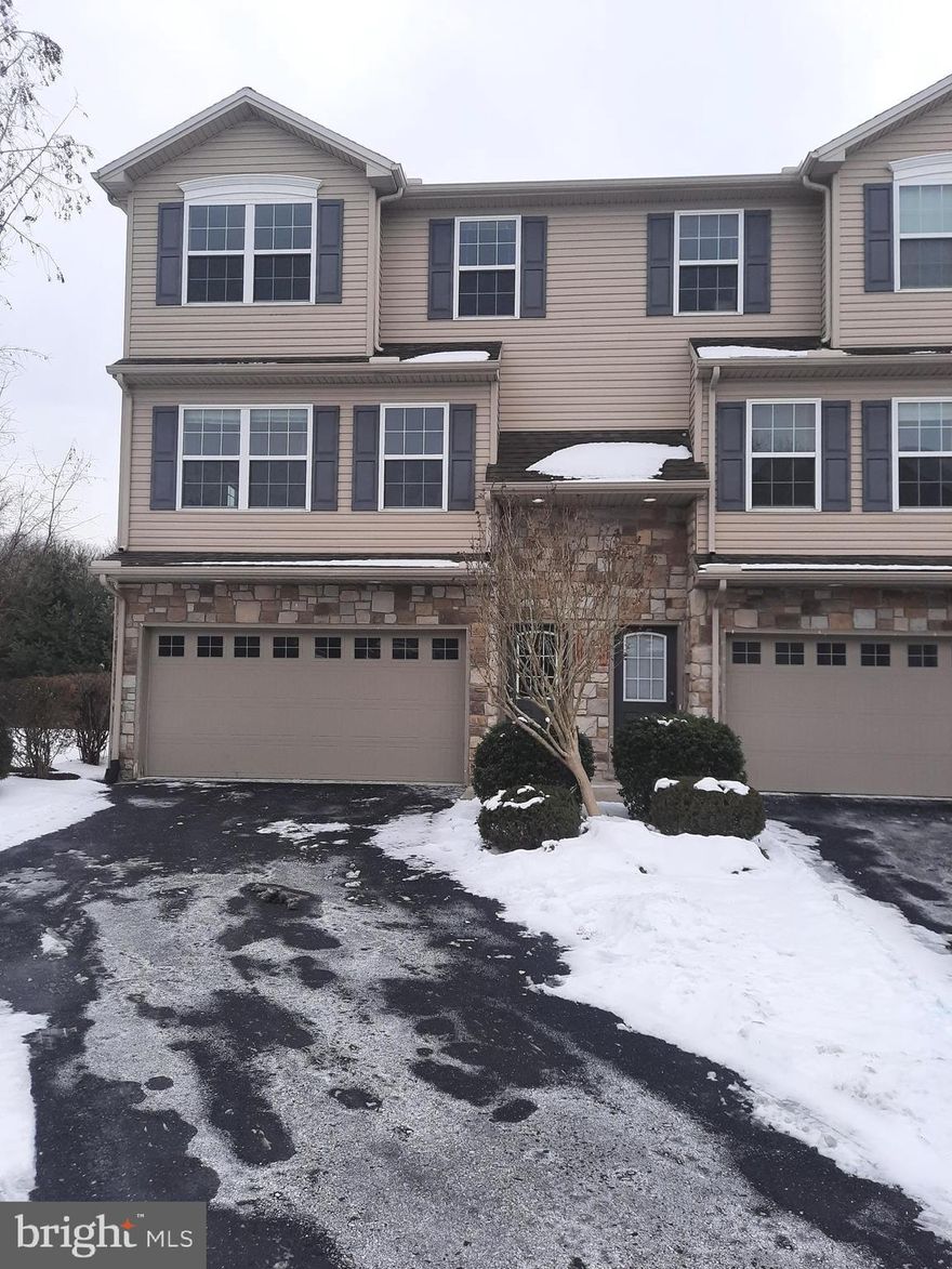 Beautiful end unit townhome available in the very popular Silver Creek development.  This townhome features over 2000 sq. ft. of living space, plus a finished bonus room on the first floor which could be used as another family room, office or fourth bedroom.