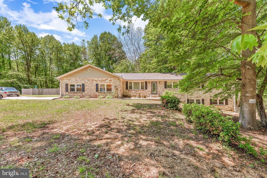 Well-maintained brick rambler on 3.01 acres in Chesapeake Beach. This 3-bedroom home comes with conveniences any family would enjoy. Including plenty of parking, a pool perfect for summer BBQs, a large backyard already fenced for kids or pets, and tree-lined for privacy. Granite countertops in the kitchen with stainless steel appliances. The bedrooms, large Family Room, dining room, and additional sitting room are all located on the main floor. The lower level features a large light-filled Family Room. Part of the lower level is unfinished with lots of storage, space for a workshop, etc. The 2-car garage has room for an additional storage area and workspace. It is being sold as-is. Conveniently located close to DC, Annapolis & Andrews AFB. Close to Chesapeake & North Beach amenities such as the boardwalk, spa, casino, charter fishing, and many restaurants.
