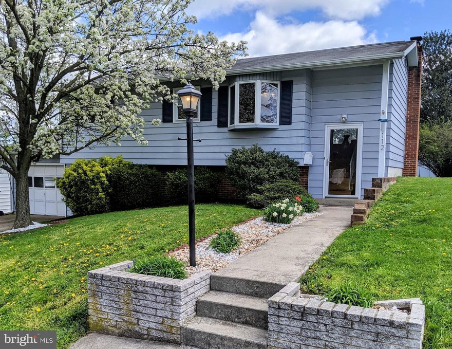 Charming 3 bedroom, 1.5 bath located in the desirable Shopes Garden neighborhood! This home features an updated kitchen with stainless steel appliances, beautiful dining room with bay window, a sizeable living room, finished lower level family room, renovated downstairs bathroom, recently installed replacement windows, a cost-effective pellet stove for supplementary heating,  an attached one car garage, and an inviting sunroom ideal for entertaining.  This family-friendly neighborhood boasts three playgrounds within walking distance and a highly sought after elementary school, conveniently situated near Rt. 283, the Turnpike, and Harrisburg International Airport!