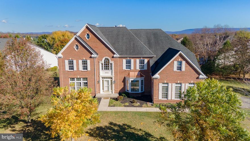 STUNNING brick front colonial boasts over 8000 finished sq ft of living space spanning 3 finished levels + a heated in-ground saltwater pool!! Main level features a soaring two story entry foyer that opens into the formal living & dining rooms and then on into the wide open main living areas that will IMPRESS!! Gourmet kitchen has a HUGE center island, cherry cabinetry, granite countertops, double oven + loads of storage & counter space. Kitchen opens into the breakfast area & then on into the SPECTACULAR two story family room with breathtaking natural light, a coffered ceiling & the focal point-a stone floor to ceiling gas fireplace!! Don't miss the front & rear staircases! There is also a large main level bedroom, powder room + laundry/mudroom. Upstairs find 4 bedrooms-EACH WITH THEIR OWN PRIVATE BATHROOM including a master suite that you will LOVE-tucked behind double entry doors you will find a private getaway that includes a cozy gas fireplace, tray ceilings, sitting room, double walk-in closets & a luxury bath with double vanities, gorgeous soaking tub & separate shower. Still need more space? The basement alone has over 2900 sq ft with a MASSIVE rec room with walk-out to rear yard, theatre room, full bathroom + 2 easy to finish rooms-one with rubber floors that would make a perfect home gym or playroom! Outside is a vacation at home with a sparkling in-ground, heated saltwater pool, patio & deck. You can also enjoy apple, peach, pear & pecan trees! Plenty of parking in the long drive or in the 2 car side load garage. All of this in the popular North End neighborhood of Paradise Manor with low HOA & NO city taxes!! You must see this one in person to appreciate all this home offers.