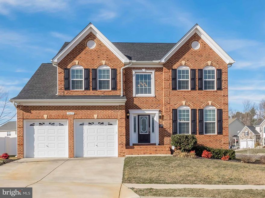 Stately Brick Front Colonial! This Beautiful Preston Model includes 4 Spacious Bedrms; 3.5 Baths; Hardwood on Main Level; Formal Living Rm with Crown Molding; Formal Dining Rm with Crown Molding & Chair Rail; Gourmet Kitchen with Granite, Custom Back Splash, Dual Ovens; Fully Finished Basement w/ Media Room & Wet Bar; Perfect Back Yard w/ Stamped Concrete Patio & Privacy Fence. Irrigation System!