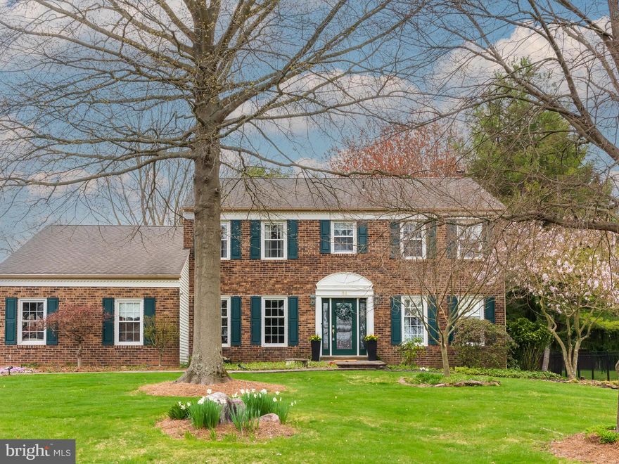 Welcome to 84 Lawrence Avenue, a stately brick colonial sitting on a beautiful lot on a quiet street in the award-winning Council Rock School District.  Step inside where 9 foot ceilings and rich crown molding welcome you from the foyer, flanked by formal living and dining rooms accented by beautiful wainscotting, hardwood floors, and sunlit spaces.  Enter the family room through French doors and admire the large bay window and brick fireplace surrounded by custom built-ins.  The spacious kitchen features a center island with a custom butcher block countertop, sleek mosaic backsplash, stainless steel appliances, and stylish pendant lighting.  Enjoy the breakfast area with soaring ceilings boasting a skylight and access to the rear patio.  This level is complete with a private home office, mudroom/laundry room off the two-car garage, and a half bath.  An expansive upper level offers 4 large bedrooms starting in the owner’s suite brimming with natural light and a generous walk-in closet. The attached renovated en suite bath provides a dual vanity with granite counter and glass shower with bench.  Three additional bedrooms are situated down the hall in addition to a full bath.  The finished basement features a bar area, playroom, expansive workshop, and plenty of storage space.  Outside enjoy the covered paver patio with ceiling fan and lighting, while overlooking the level yard with a dedicated garden.  A large deck off the family room also sits in the backyard allowing for even more outdoor entertaining space!  This home has been meticulously cared for and is ready for you to create new memories!