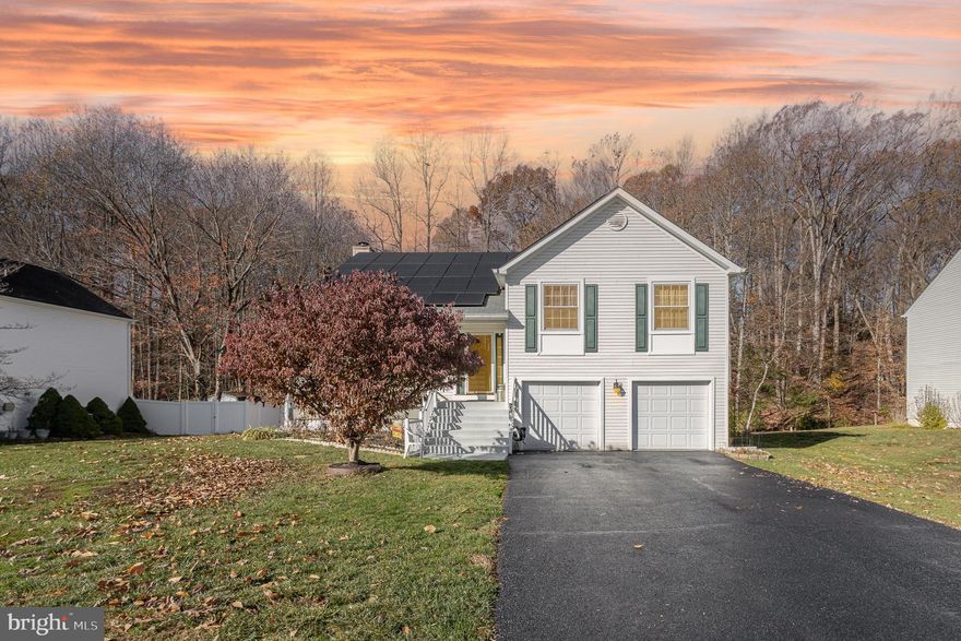 Location, location, location! Welcome home to this charming split-level home with 4 bedrooms and 3 bathrooms, ideally located near I-95, local entertainment, and minutes from Quantico Marine Corps Base. Inside, you’ll find a bright, open layout with updated windows that fill the living spaces with natural light. The finished basement offers a comfortable additional living area, perfect for relaxing or entertaining, while a second, unfinished lower level provides ample storage space for all your needs.

With a newer roof( 2017), new microwave (2024), gutter guards (2020( and energy-efficient solar panels, this home offers sustainability and savings in one. Don’t miss your chance to tour this spacious, well-maintained home—schedule your visit today!