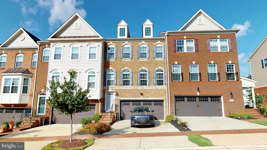 BACK ON MARKET!  Buyers financing fell through!! This beauty with trex  decking and fenced in back yard is looking for a new owner.  Features a large kitchen floor plan with a center island and additional seating with wide plank flooring on the entire main living area. There is a bathroom on every level of this home.  This brick front townhome is inside of the gorgeous Beechtree community with all the amenities a homeowner could ask for.