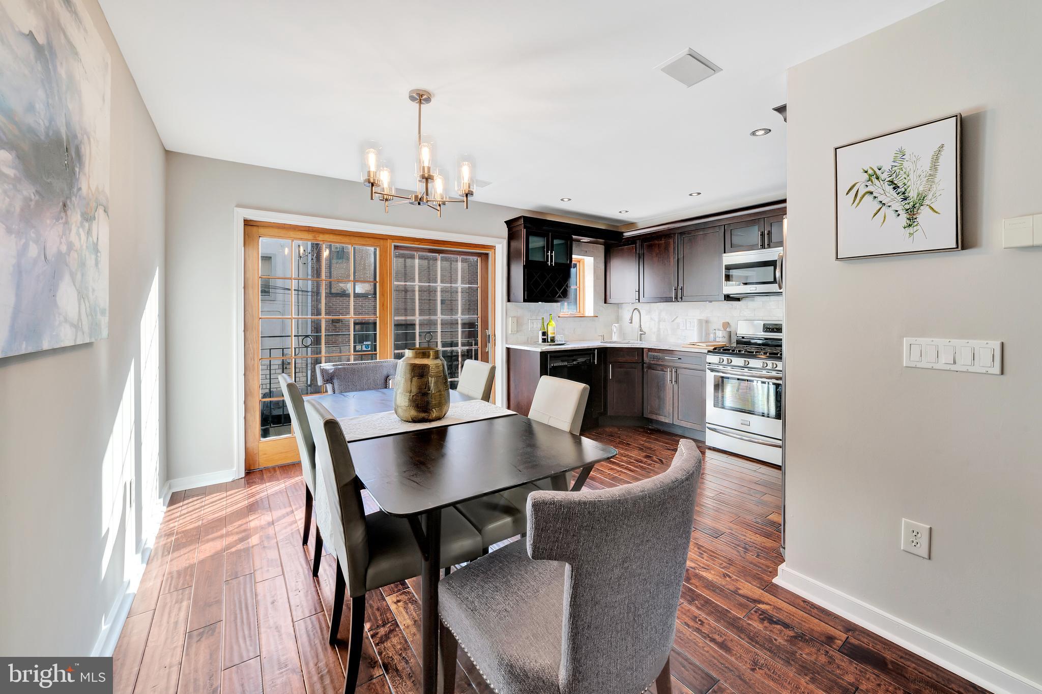 Bring your fresh baguette and bottle of wine home to 503 Clymer Street in the heart of quaint Queen Village. Pull into your private, off-street deed parking. Enter through a private courtyard that creates a European flavor of privacy in a cosmopolitan setting. The best of what Center City offers - village community in the midst of urban sophistication. Creative open, multi-level floor plan. Lower level living area with fireplace and patio views with vaulted opening to dining / kitchen level with juliette balcony. Up one level to two bedrooms, full bath and laundry. Top floor is a private primary bedroom suite with walk-in closet, en-suite bath and charming private deck. Romantic glass of wine, or early morning coffee - whatever flavor is best for you!