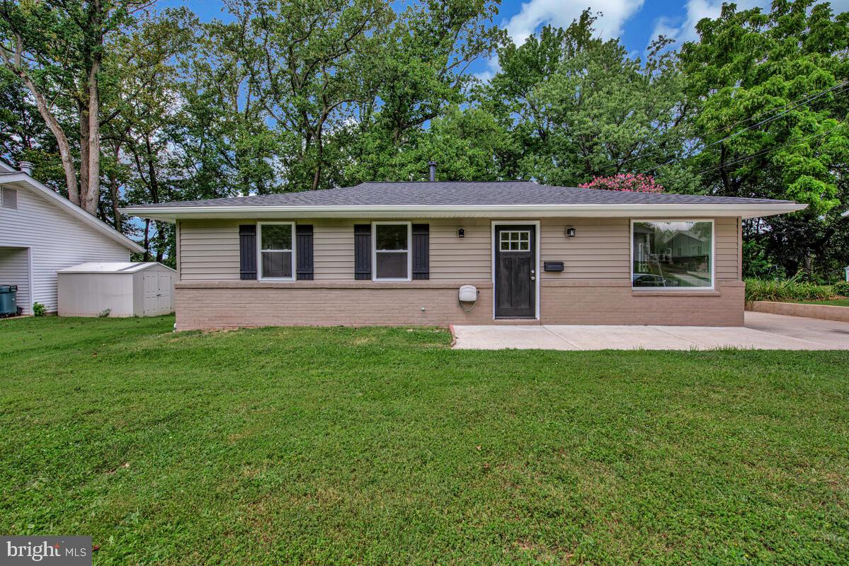 Gorgeous totally renovated 4 Bedroom 3 Full Bath Rancher in sought after Boxwood Village! Home is being sold for the first time since the original owner bought it in 1966. Main level with 3 large bedrooms and 2 full baths including refinished hardwood floors. Open living room with huge picture window and separate eat in dining/living room. Primary bedroom with double closet, en-suite bathroom and luxury shower. Modern open kitchen featuring 42" White Shaker cabinets, quartz countertops, stainless steel appliances and luxury vinyl plank floors. Fully finished lower level with large rec room, fireplace and full bath. Massive rear 4th bedroom, theater room, office, etc. Walkout from lower level to gorgeous flat yard with a detached shed overlooking a large wooded area. Oversized driveway that can fit a minimum of 4 cars, quiet cul-de-sac location, Greenbelt amenities such as the Roosevelt center, movie theater, restaurants and shops nearby. Fantastic location with an easy commute to 495/95 or BW Parkway. A Must See!